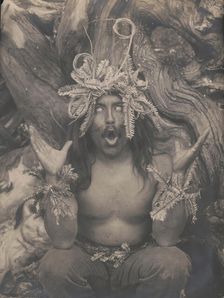 Hamatsa emerging from the woods-Koskimo, c1914. Creator: Edward Sheriff Curtis