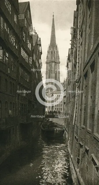 'Hamburg - Fleet with St. Nikolai Tower', 1931. Artist: Kurt Hielscher.