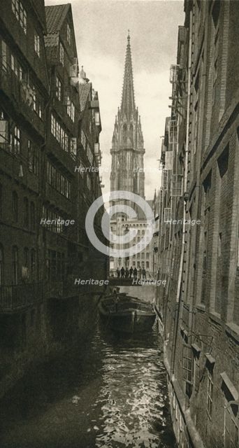 'Hamburg - Fleet with St. Nikolai Tower', 1931. Artist: Kurt Hielscher.