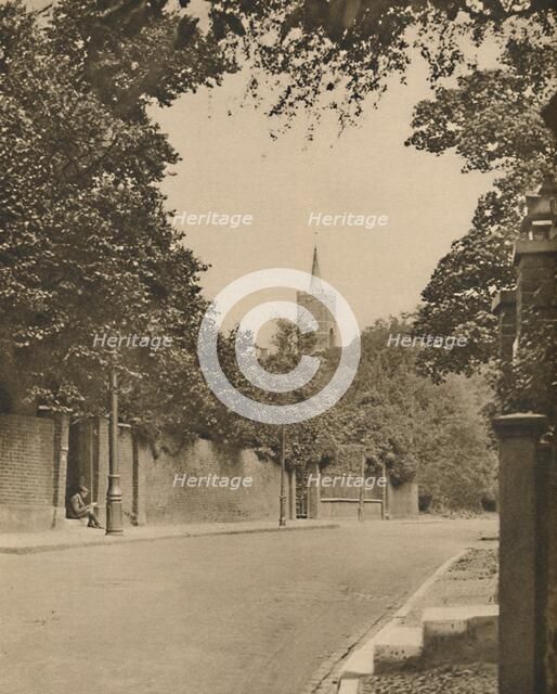 'Hampstead Church from Between the Leafy Walls of Frognal Lane', c1935. Creator: Donald McLeish.