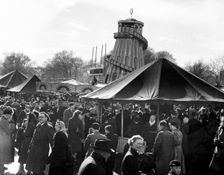 Hampstead funfair, London, early 1950s. Creator: Henry Grant