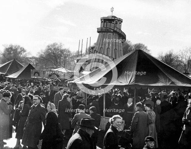 Hampstead funfair, London, early 1950s. Creator: Henry Grant.