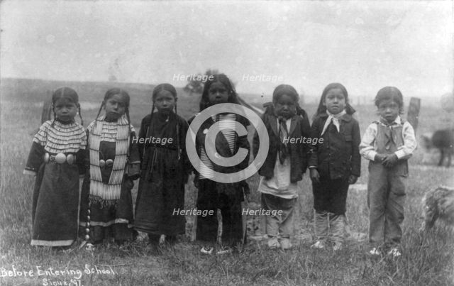 Hampton Institute, Hampton, Va. - before entering school - seven Indian children..., 1899 or 1900. Creator: Frances Benjamin Johnston.