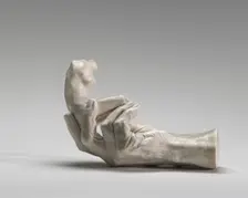 Hand of Rodin with a Female Figure, 1917. Creator: Auguste Rodin