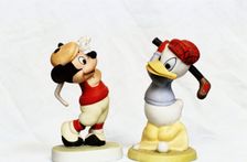 Hand-painted golfing figures of Mickey Mouse and Donald Duck, c1930s. Creator: Unknown