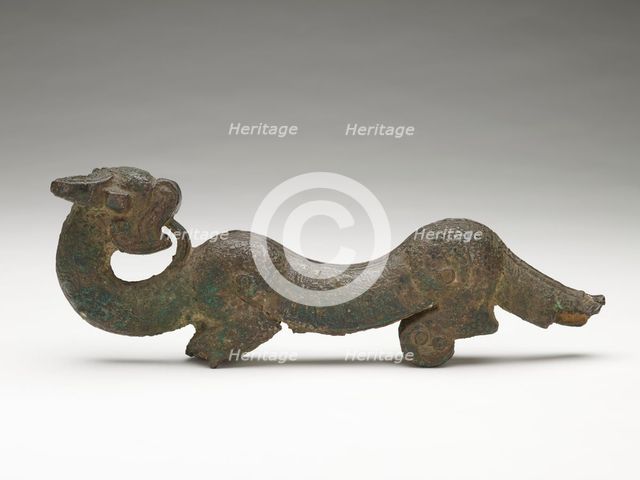 Handle in the form of a dragon from a bronze..., Eastern Zhou dynasty, late 6th-early 5th cent BCE. Creator: Unknown.