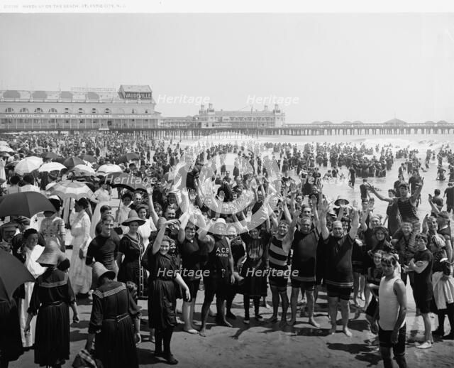 Hands up on the beach at Atlantic City, N.J., between 1900 and 1920. Creator: Unknown.