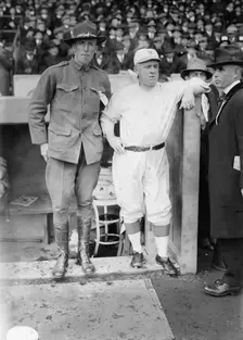 Hank Gowdy in military uniform with manager John McGraw, New York NL (baseball), 1917. Creator: Bain News Service