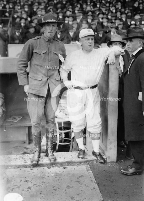 Hank Gowdy in military uniform with manager John McGraw, New York NL (baseball), 1917. Creator: Bain News Service.