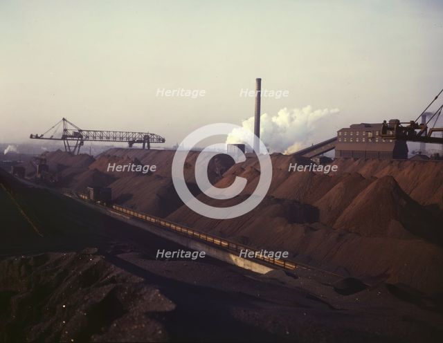 Hanna furnaces of the Great Lakes Steel Coporation, stock pile of coal and..., Detroit, Mich., 1942. Creator: Arthur S Siegel.