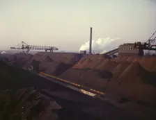 Hanna furnaces of the Great Lakes Steel Coporation, stock pile of coal and..., Detroit, Mich., 1942. Creator: Arthur S Siegel