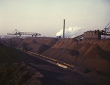 Hanna furnaces of the Great Lakes Steel Coporation, stock pile of coal and..., Detroit, Mich., 1942. Creator: Arthur S Siegel