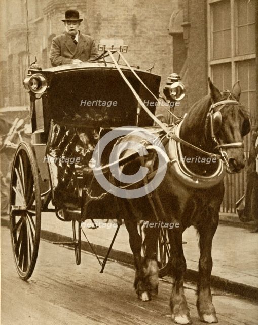 Hansom cab, c1910, (1935). Creator: Unknown.