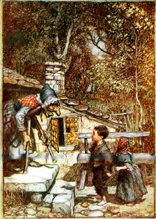 Hansel and Gretel and the Witch on the doorstep of her cottage. Artist: Arthur Rackham