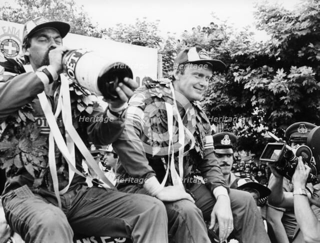 Hans Thorszelius drinking champagne and Bjorn Waldegaard, winners of the Acropolis Rally, 1979. Artist: Unknown