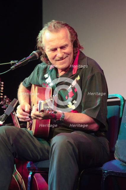 Hans Theessink, Hawth, Crawley, West Sussex, 2014.  Artist: Brian O'Connor.