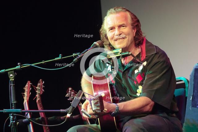 Hans Theessink, Hawth, Crawley, West Sussex, 2014.  Artist: Brian O'Connor.