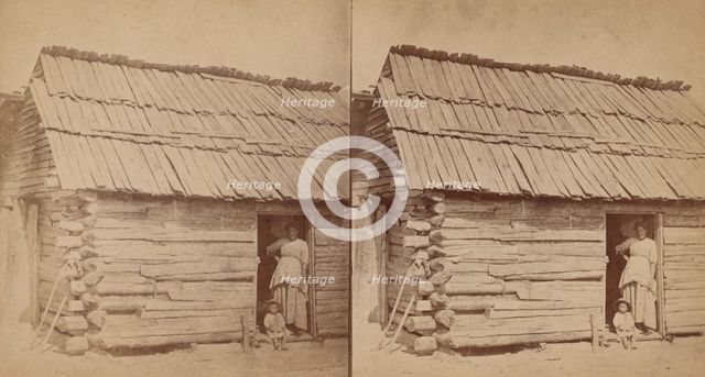 Happy little nig. [Woman and a small child in a cabin doorway], (1868-1900?). Creator: O. Pierre Havens.
