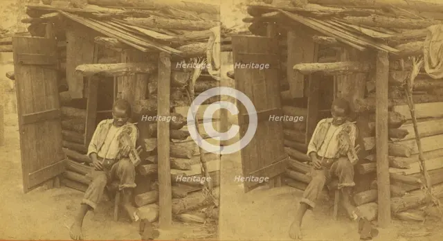 Happy little Bob. [Man playing fiddle in front of cabin], (1868-1900?). Creator: O. Pierre Havens.