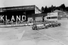 Harker Special of WE Harker and Bugatti Type 37 of John Appleton, BARC meeting, Brooklands, 1933. Artist: Bill Brunell