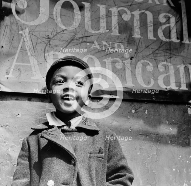 Harlem newsboy, New York, 1943. Creator: Gordon Parks.
