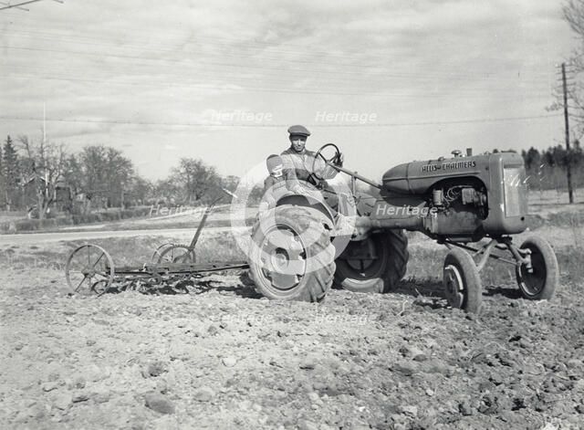 Harrowing with an Allis-Chalmers tractor, Sweden, 1950. Artist: Torkel Lindeberg