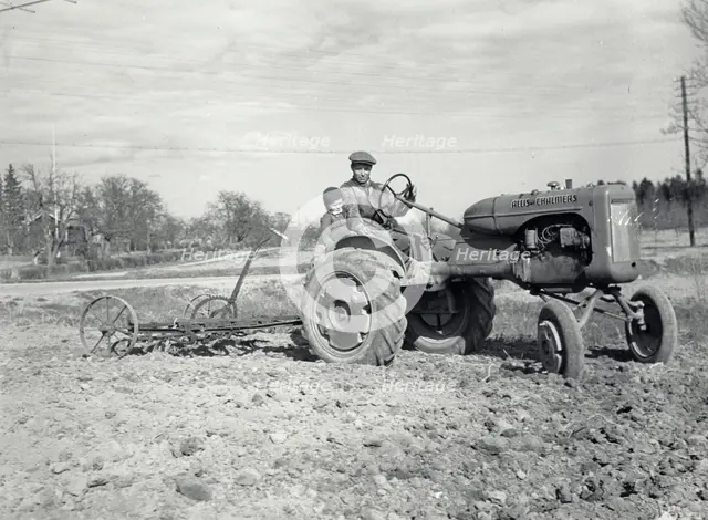 Harrowing with an Allis-Chalmers tractor, Sweden, 1950. Creator: Torkel Lindeberg.