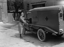 Harriman, Mrs. James Borden with Red Cross Ambulance, 1917. Creator: Harris & Ewing