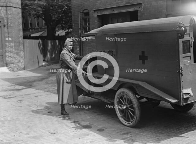 Harriman, Mrs. James Borden with Red Cross Ambulance, 1917. Creator: Harris & Ewing.