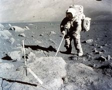 Harrison Schmitt works the scoop on the lunar surface, Apollo 17 mission, December 1972. Creator: NASA