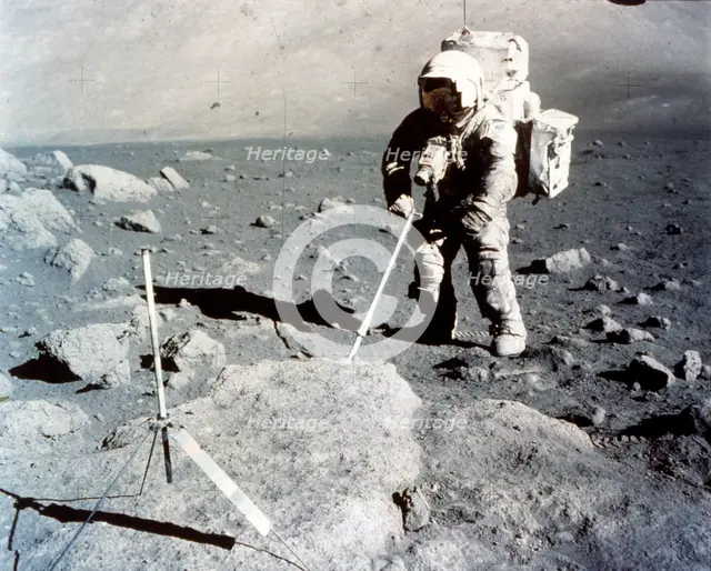 Harrison Schmitt works the scoop on the lunar surface, Apollo 17 mission, December 1972. Creator: NASA.