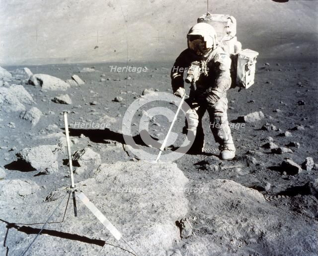 Harrison Schmitt works the scoop on the lunar surface, Apollo 17 mission, December 1972. Creator: NASA.