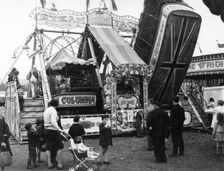 Harry Lee's Steam Yachts swingboat ride, Goose Fair, Nottingham, Nottinghamshire, 1968. Creator: George L Roberts
