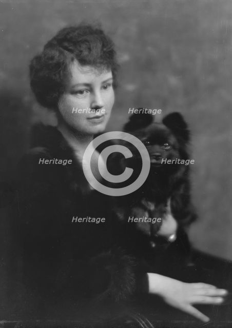 Hartshorne, Miss, with dog, portrait photograph, 1917 May 15. Creator: Arnold Genthe.