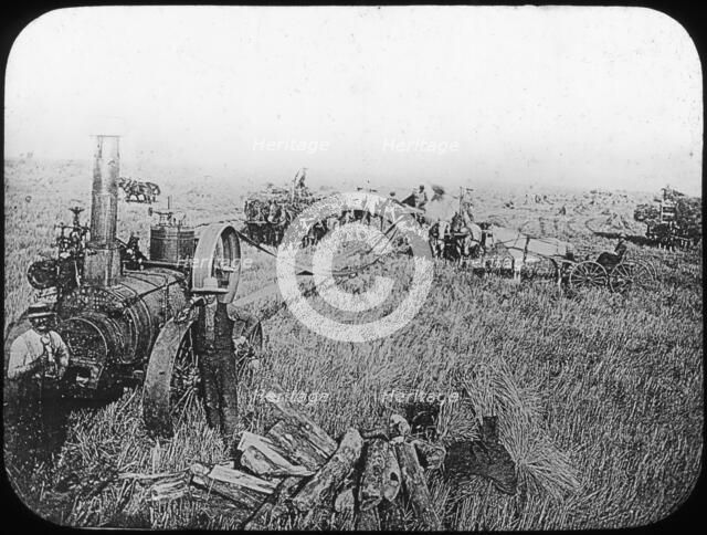 Harvest scene on the North American prairies, late 19th or early 20th century. Artist: George Philip & Son Ltd