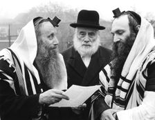 Hasidic Jews wearing tefillin and tzitzit, 1981. Creator: Sidney Harris