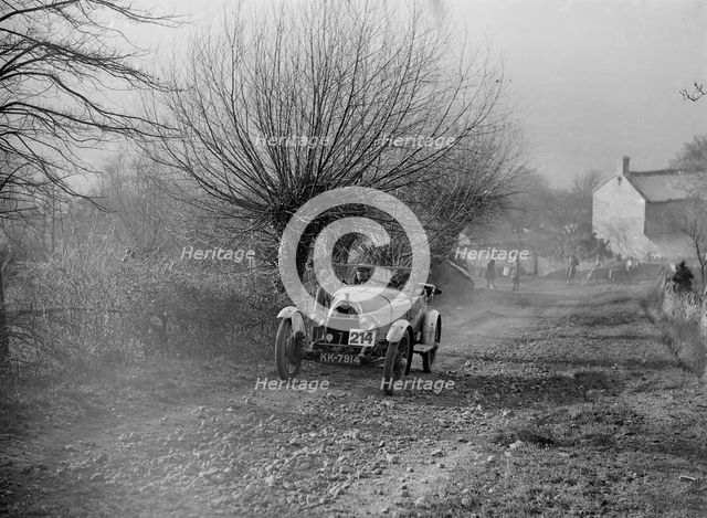 HE 14/40 taking part in a winter motoring trial, c1930s. Artist: Bill Brunell.