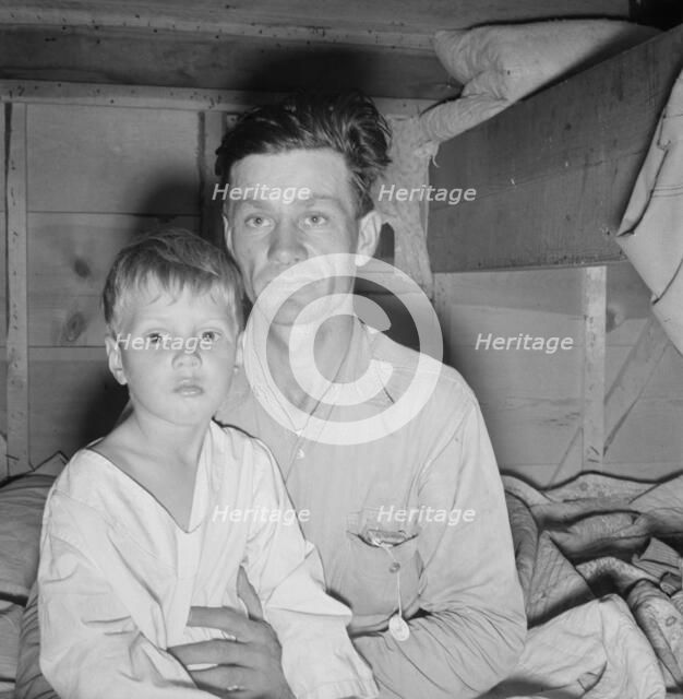 He brought his family to the west in a homemade trailer..., Merrill, Klamath County, Oregon, 1939. Creator: Dorothea Lange.