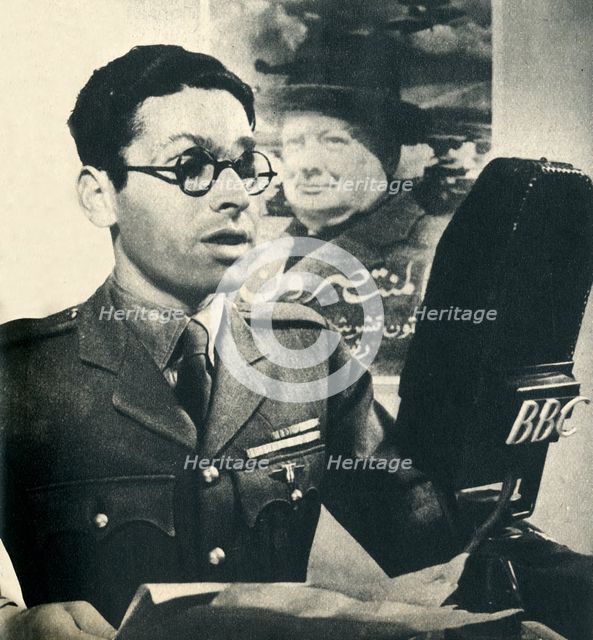 'He reads the news in Moroccan Arabic. A member of the Fighting French Army', 1942. Creator: Unknown.