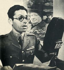 He reads the news in Moroccan Arabic. A member of the Fighting French Army 1942. Creator: Unknown