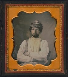 Head and shoulders portrait of a man, possibly a plasterer, seated, smoking a pipe, ca. 1850s. Creator: Unknown