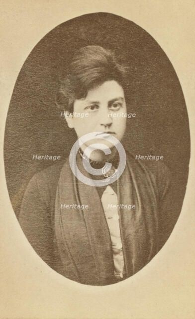 Head-and-shoulders portrait of woman, facing slightly right, between 1880 and 1886. Creator: Unknown.