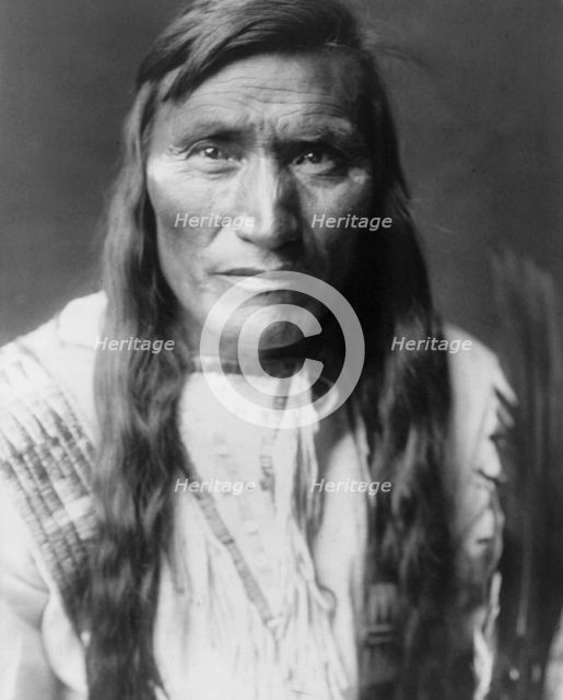 Head Dress-Atsina, c1908. Creator: Edward Sheriff Curtis.