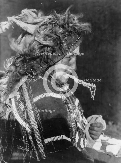 Head-dress of Matóki Society-Blood, c1927. Creator: Edward Sheriff Curtis.