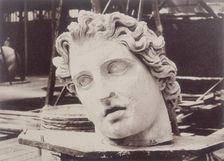 Head from one of the Colossi of Monte Cavallo, Rome, by Phidias Crystal Palace, 1852-1854. Creator: Philip Henry Delamotte