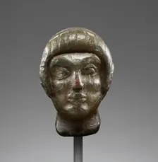 Head from a Statuette of a Youth, early 5th century BC. Creator: Unknown
