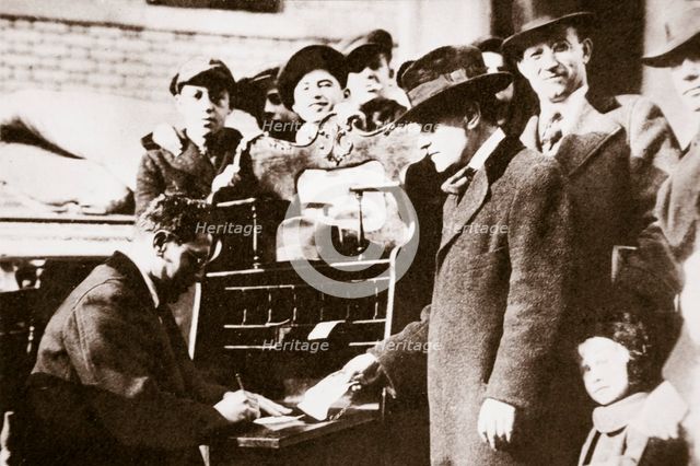 Head of the Anti-Rent League enrolling new members in New York USA, early 1919. Artist: Unknown