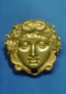 Head of the Gorgon Medusa in embossing gold, piece from the royal tomb at Vergina (350 BC)