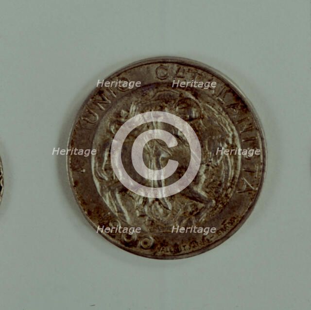 Head of a one-peseta coin in silver used as a medal of the Catalanist Union, work of the engravin…