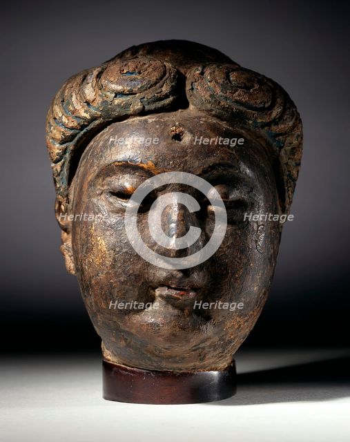Head of a Buddha (Fotuo), between c.800 and c.906. Creator: Unknown.